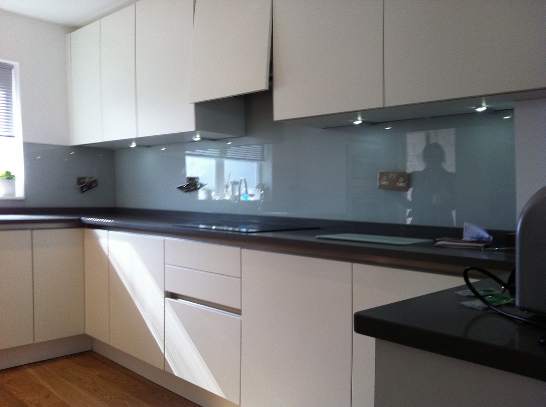 Grey glass kitchen splashback with LED lighting in Amersham