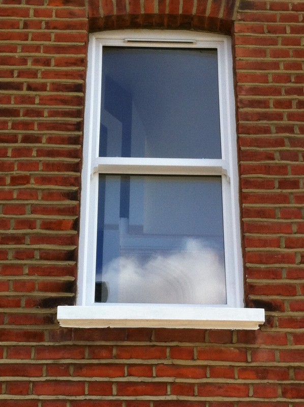 uPVC sash window on Victorian red brick house in Amersham